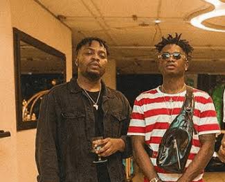 Olamide and Lil Kesh on Logo Benz